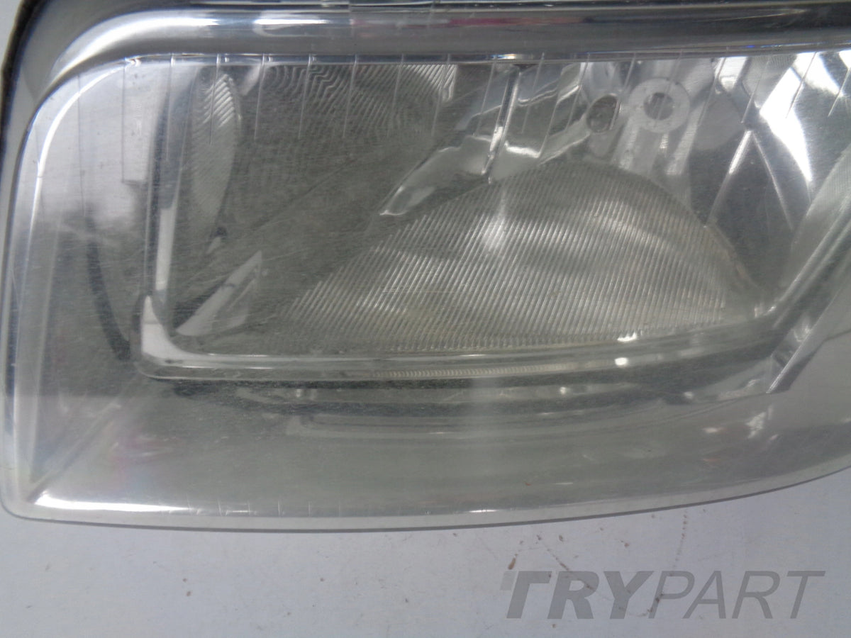 LEFT HEADLIGHT LAMP VW T5 7H 7H0 03-09