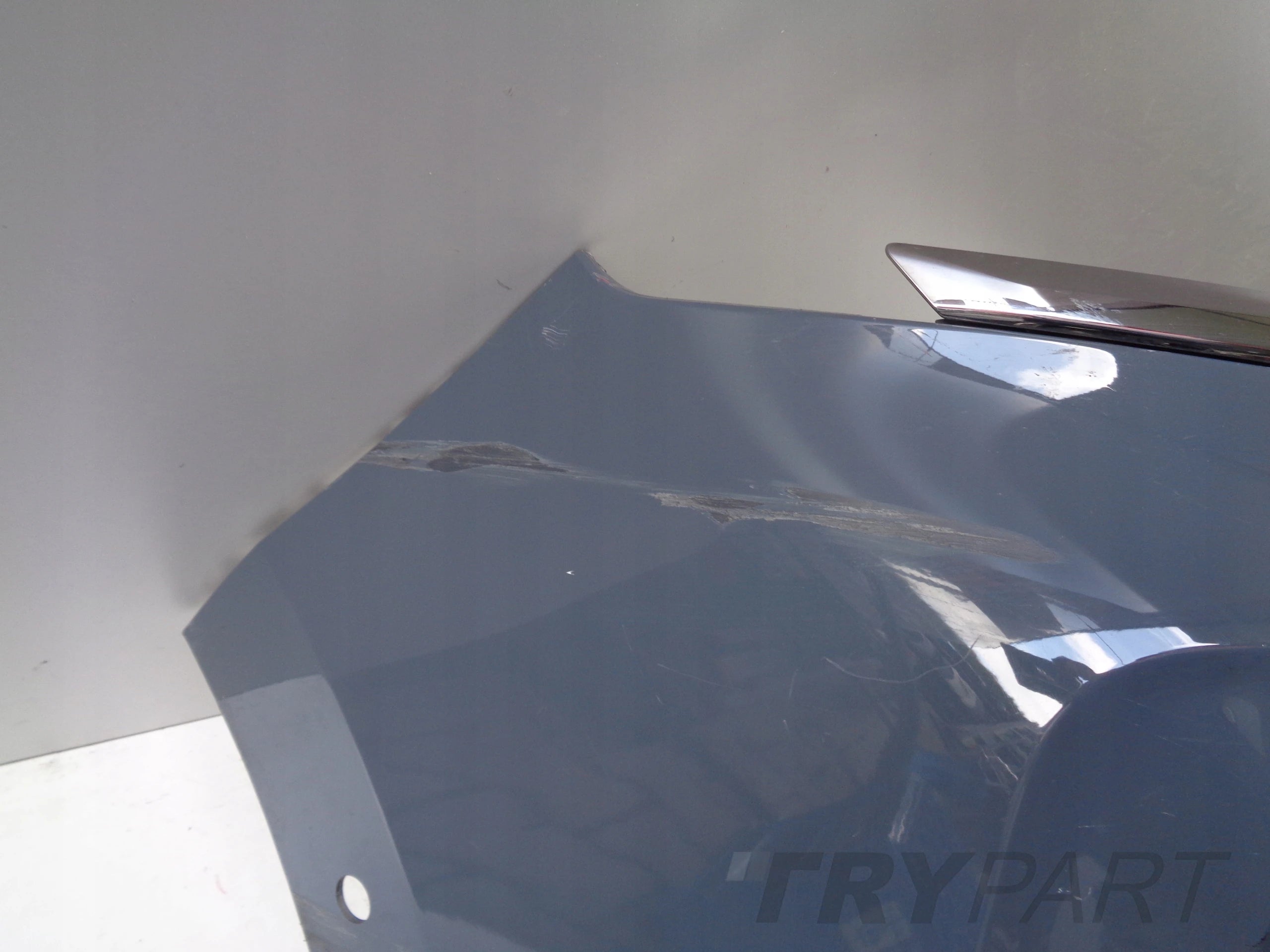 NISSAN TOWNSTAR 22- FRONT BUMPER NO. 51234 + CHROME TRIMS