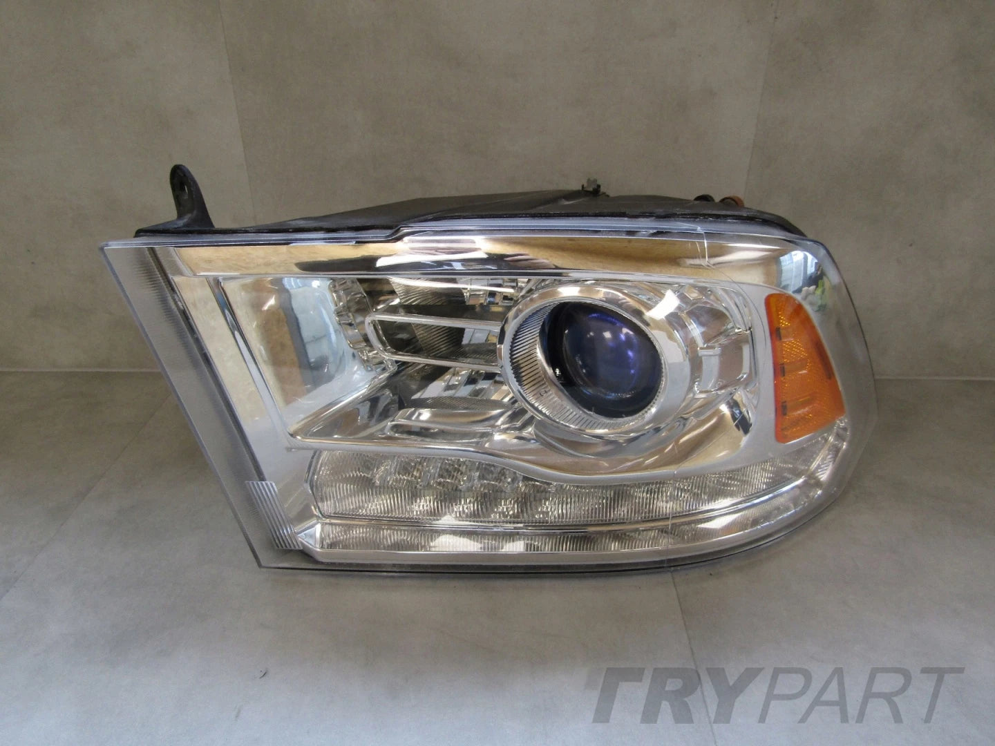 Headlight for Dodge RAM 1500 PLAIN LENS 10-15 LH